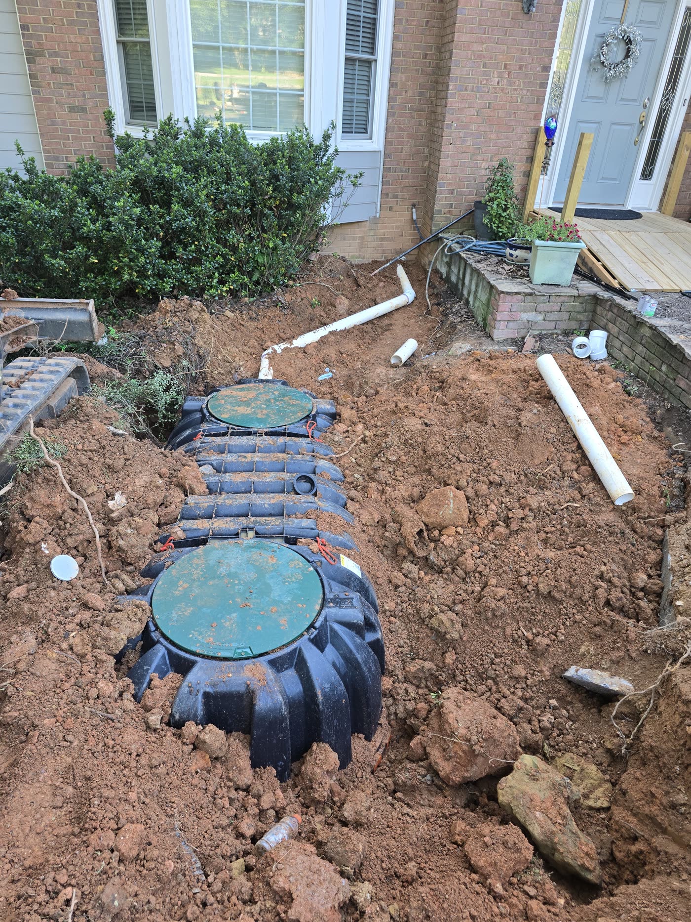 Before — new septic tank being installed in a Canton front yard