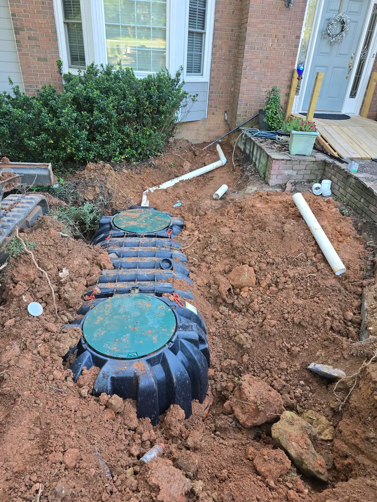 Before — new septic tank being installed in a Canton front yard