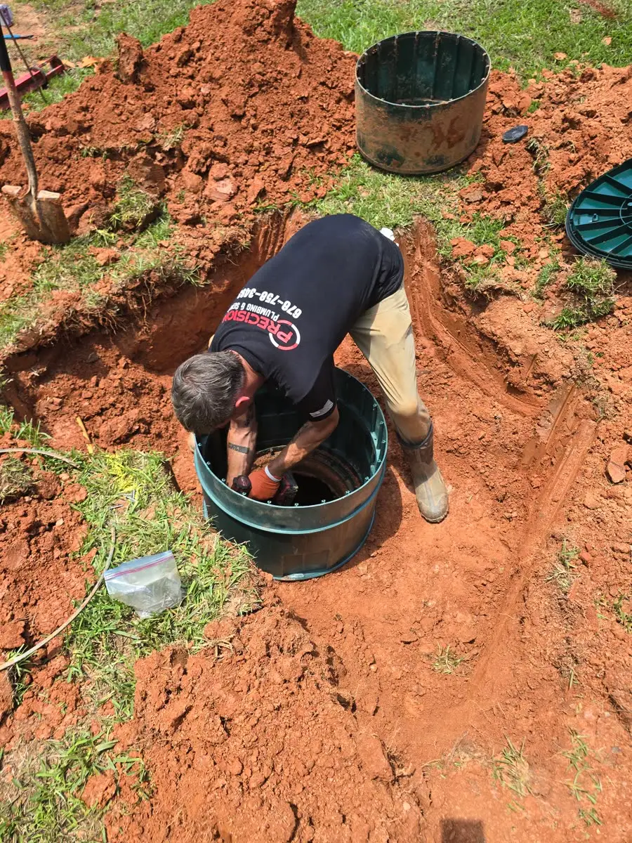 Septic tank lid and riser on a completed install